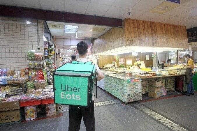 Uber宣布併購皇冠大車隊。圖/北市府提供
